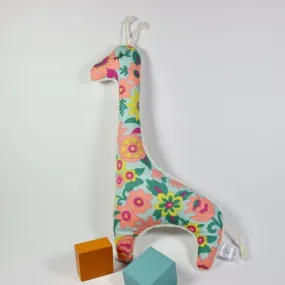 Gros doudou "girafe fleurs orange fluo".